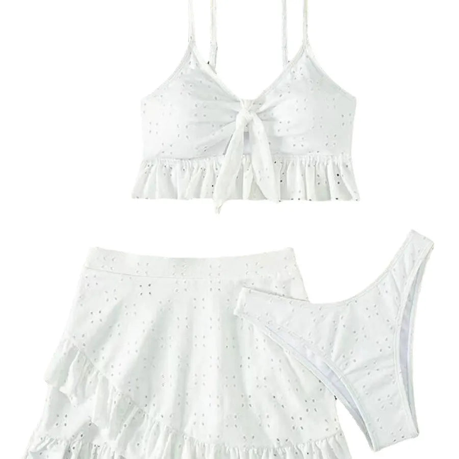White eyelet top and skirt set on a white background