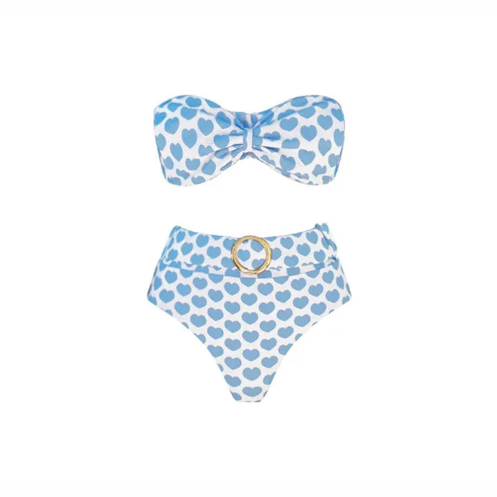 white sleeveless bikini swimsuit with light blue hearts pattern. bikini bottoms are white with light blue hearts patten